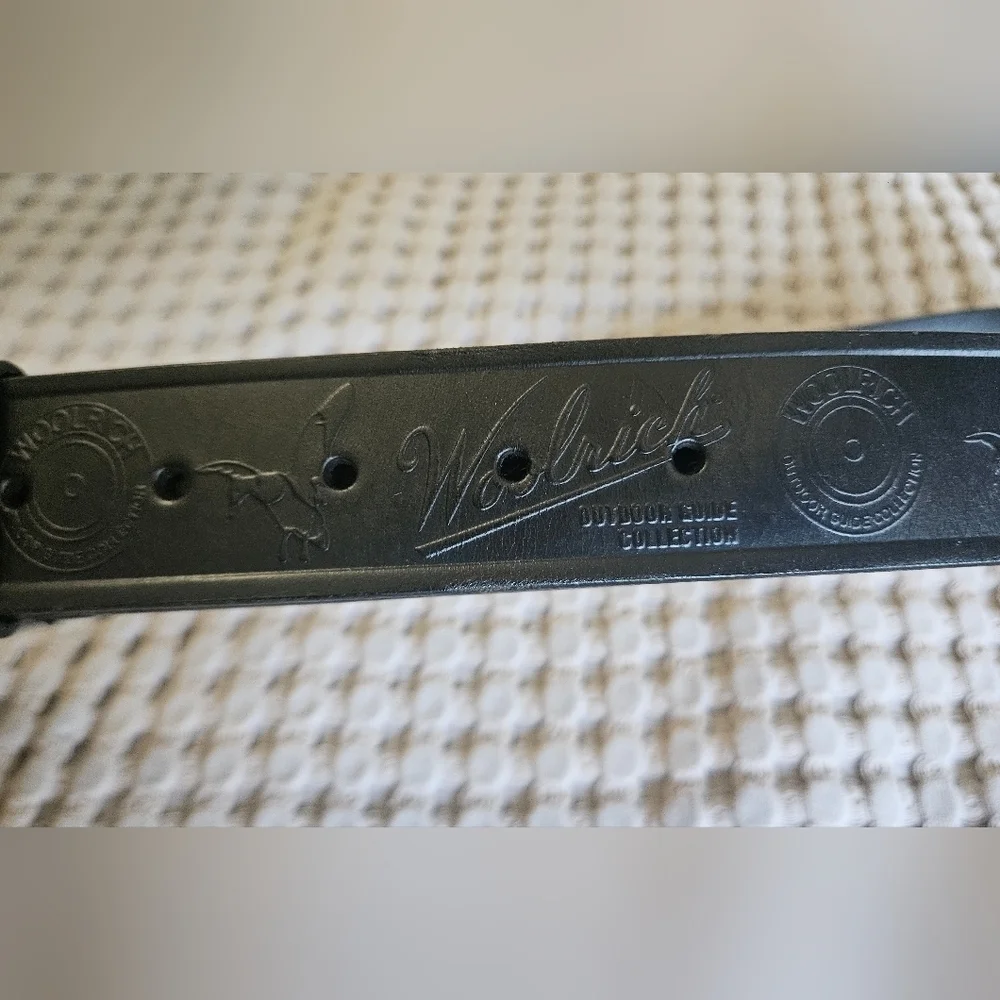 WOOLRICH Outdoor Guide Collection Leather Belt In Black with Gold Buckle.